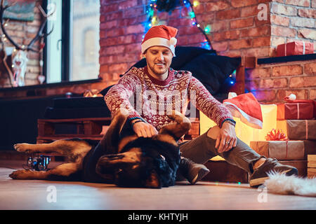 Ein Mann mit Hund. Stockfoto