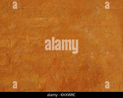 Texturierte leer ockerfarbene Wand als stilvolle Hintergrund/Hintergrund Stockfoto