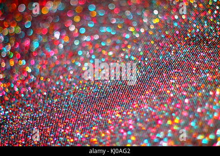 Abstrakte helle farbige bokeh Hintergrund. lurexfaden. Die geringe Tiefenschärfe. Stockfoto