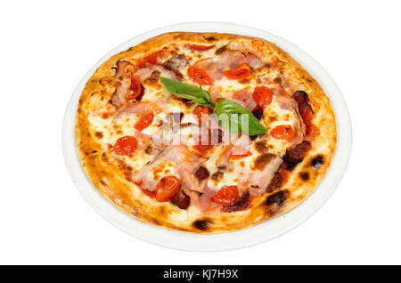 Pizza mit Kirschtomaten, Fleisch und Käse. Stockfoto