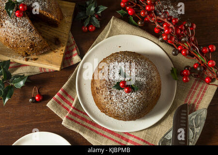 Süße hausgemachte Weihnachten Figgy Pudding mit Puderzucker Stockfoto