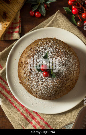 Süße hausgemachte Weihnachten figgy Pudding mit Puderzucker Stockfoto