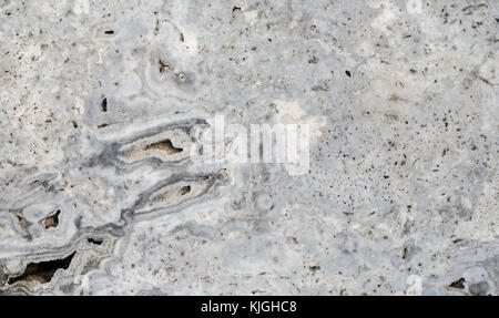 Graue Marmoroberfläche mit Adern und glänzend abstrakten Textur