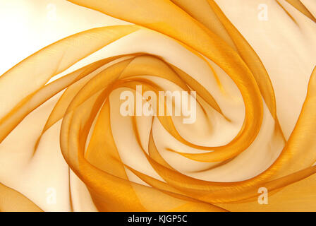 Golden organza Stoff wellige Textur Stockfoto