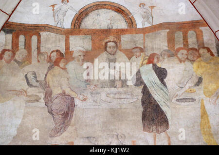 Vault de Lugny Kirche. Wandmalerei aus dem 16. Jahrhundert. Christus in seinem Leiden. Das letzte Abendmahl von Jesus und seinen Jüngern geteilt. Frankreich. Stockfoto