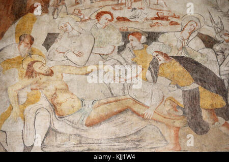 Vault de Lugny Kirche. Wandmalerei aus dem 16. Jahrhundert. Christus in seinem Leiden. Jesus wird ins Grab gelegt. Frankreich. Stockfoto
