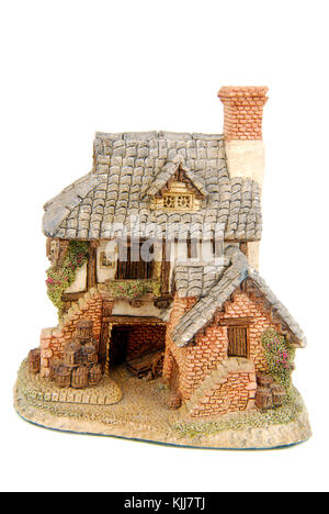 Miniatur Haus isoliert auf weiss Stockfoto