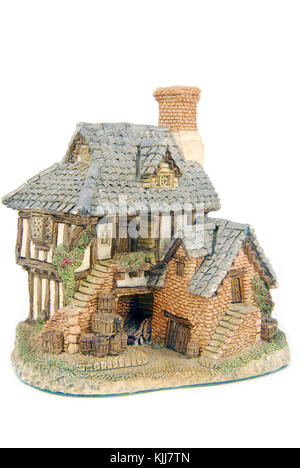 Miniaturausgabe Haus isoliert auf weiss Stockfoto