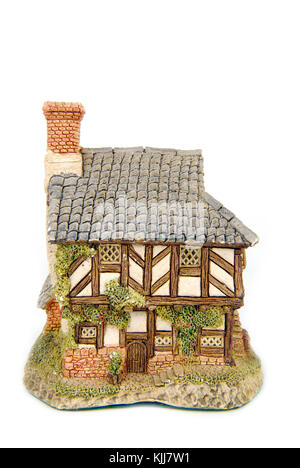 Miniatur Haus isoliert auf weiss Stockfoto