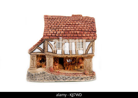 Miniatur Haus isoliert auf weiss Stockfoto