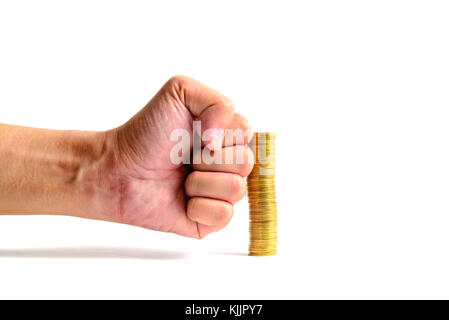 Handstanze die zunehmende Spalten der Goldmünzen auf weißem Hintergrund, Stapel von Goldmünzen von der hammer Hand brechen, Business bankrott Konzept, Stockfoto