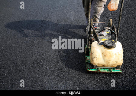 Straßenarbeiter und Asphalt. Frankreich. Stockfoto