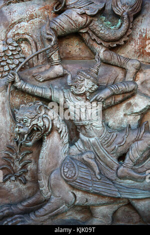 Wat Trahimit, Bangkok. Reliefs. Thailand. Stockfoto