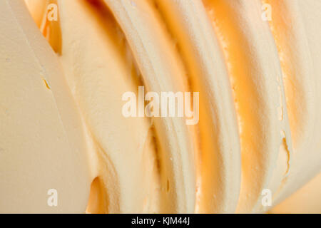 Nahaufnahme von Schlagsahne orange Creme. Stockfoto