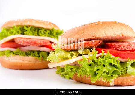 Zwei salami Sandwiches auf weißem Hintergrund Stockfoto