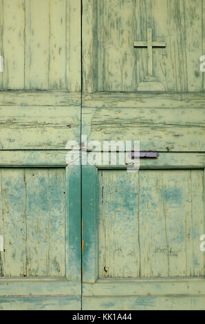 Verwitterte grün lackiert Tür auf alte Kapelle, Florenz, Italien Stockfoto