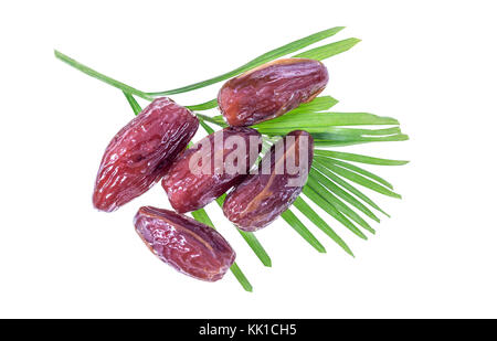 Datum palm Obst exotische Trockenfrüchte auf Blatt gegen den weißen Hintergrund fera Obst auf Weiß langsam kippen close-up Stockfoto