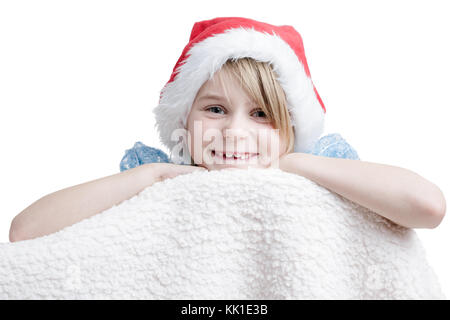 Happy 7 Jahre altes Mädchen in Santa Hut Stockfoto