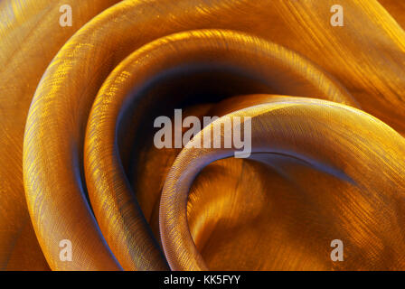 Golden organza Stoff wellige Textur Stockfoto