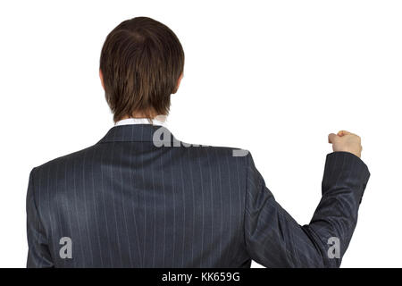 Unternehmer, die bis von hinten eine imaginäre Poster auf weißem Hintergrund. Stockfoto