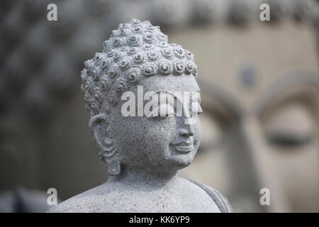 Buddha Figur aus Stein - Buddha Figur aus Stein Stockfoto