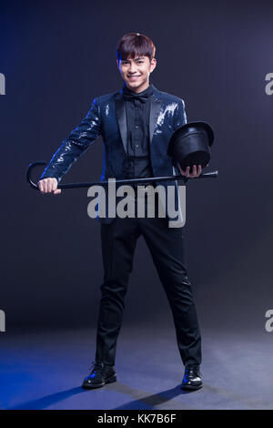 Junge chinesische männliche Magier Stockfoto