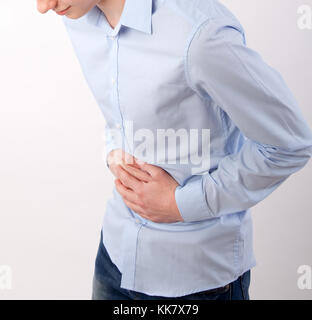 Teenager mit Magenschmerzen Stockfoto