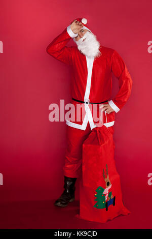 Der Weihnachtsmann hat es satt, Geschenke zu liefern Stockfoto