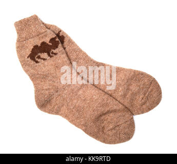 Socken aus Kamel Wolle auf weißem Hintergrund Stockfoto