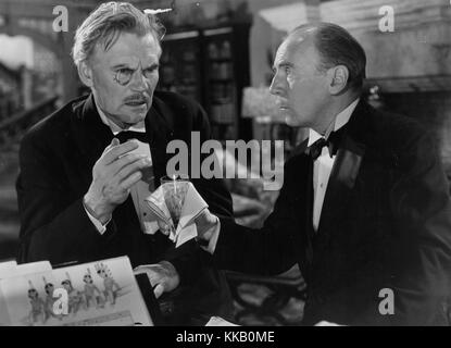 Amerikanischer Schauspieler Walter Huston und ein unbekannter Reifen männlichen Schauspieler in einem Film Still, 1940. Stockfoto