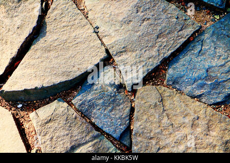 Natursteine Pflaster Hintergrund. Cobblesones Muster. Stockfoto