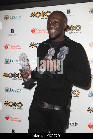 Stormzy mit seinem besten männlichen, Best Album und Best grime Star Awards in der 22 Mobo Awards statt an der Leeds Erste direkte Arena, Clay Pit Lane, Leeds. Stockfoto