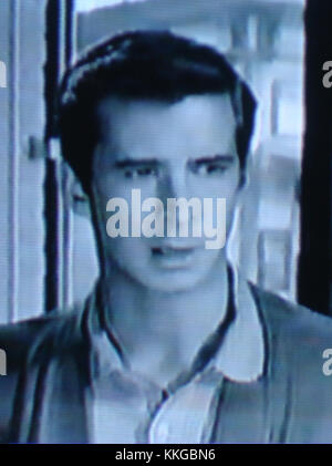 The Tin Star, ein Western-Film aus dem Jahr 1957 mit Anthony Perkins in der Hauptrolle, zeigt die Rolle eines Sheriffs, der einen wichtigen Schritt in Perkins Schauspielkarriere darstellt. Stockfoto