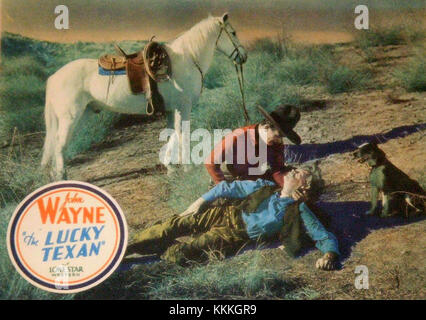 Die Lobbykarte für den Film Lucky Texan (1924) zeigt ein Werbebild aus dem Stummfilm Western. Der Film spielt John Wayne in einer seiner frühen Rollen, in der er einen Cowboy an der amerikanischen Grenze darstellt. Stockfoto