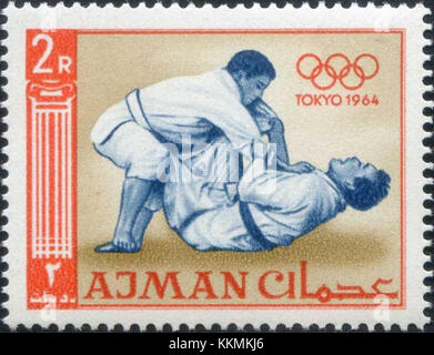 1965 Briefmarke des Ajman Tokyo Olympics Judo5 Stockfoto