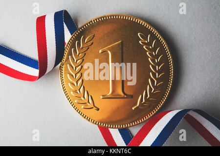 Gold erste Platzsieger Medaille. Erfolg Leistung Konzept Stockfoto