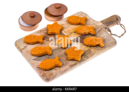 Kinder essen. nuggets von Fischen Stockfoto