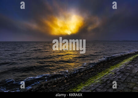 Der dollart aus gesehen von termunterzijl bei Sonnenaufgang Stockfoto