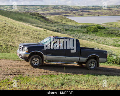 Cowboss george Gaber in panel Truck auf Ranch Stockfoto