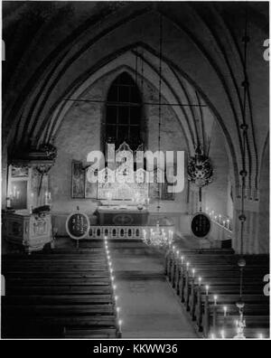 Die Botkyrka-Kirche befindet sich in Botkyrka, Schweden. Bekannt für ihre historische Architektur, ist die Kirche eine prominente religiöse Stätte mit tiefer kultureller Bedeutung innerhalb der lokalen Gemeinschaft. Stockfoto