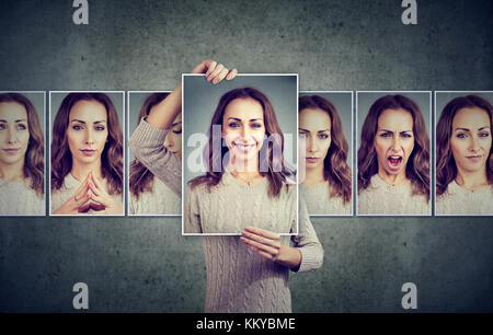 Maskierte Frau verschiedene Emotionen ausdrücken Stockfoto