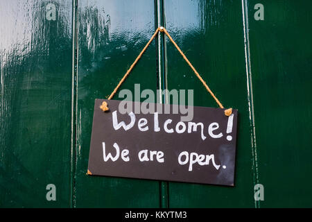 Sign of shop saying "We are Open" Stockfoto