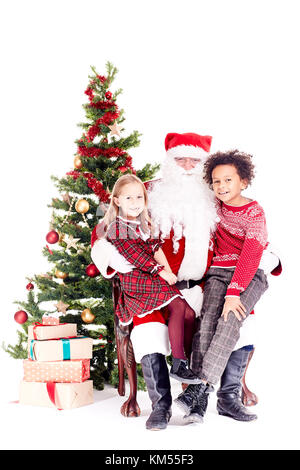 Kinder mit Santa Claus Stockfoto