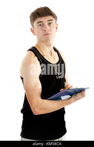 Teenage personal trainer Schreiben auf einem Klemmbrett auf weißem Hintergrund Stockfoto
