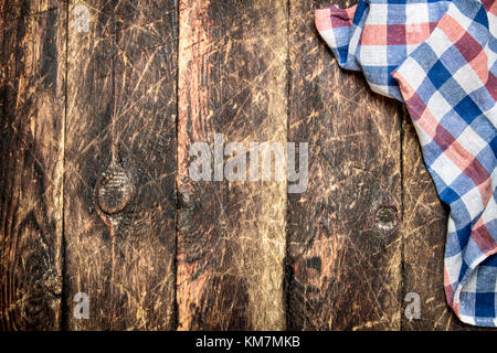 Hintergrund dienen. textile Serviette. Auf einem Holztisch. Stockfoto