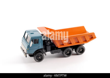 Eine kleine Kopie dump Lkw auf einem weißen Hintergrund aus Metall Stockfoto