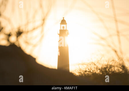 Leuchtturm und untergehende Sonne in Ponce Inlet Florida Stockfoto