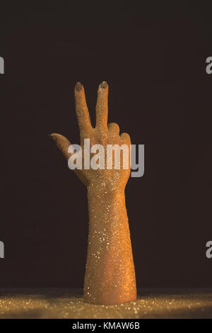 Wachs hand mit drei Fingern Stockfoto