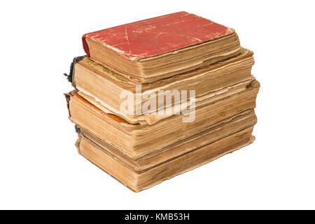 Ein Stapel Alter zerschlissenen Bücher. Vintage zerrissene Bücher. Antiquitäten isoliert. Stockfoto