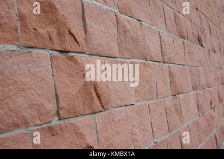 Wand roten Steinen Stockfoto